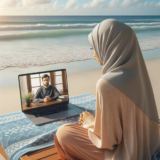 picture of a client on the beach sitting with their computer looking at their therapist inside the computer screen doing therapy through the computer screen.